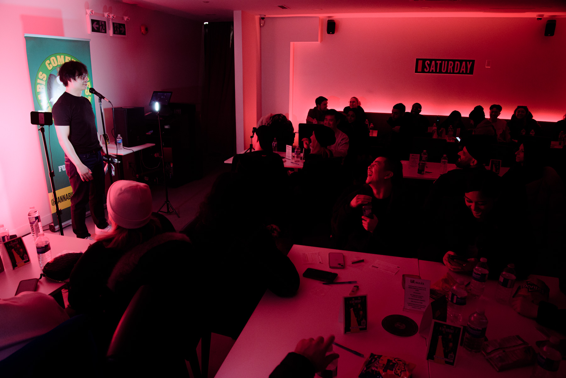 Intimate comedy club atmosphere